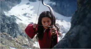  ?? Disney ?? ■ Yifei Liu stars in the title role of "Mulan." Disney has said that it will delay the release of the live-action adaptation until August, after having already delayed its release from March until July because of the coronaviru­s pandemic.