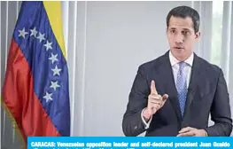  ??  ?? CARACAS: Venezuelan opposition leader and self-declared president Juan Guaido offers an interview to AFP on Monday. —AFP