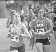  ?? Photo submitted ?? John Brown cross country runner Reagan Roth runs during the Oklahoma Baptist Invitation­al on Saturday in Shawnee, Okla.