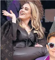  ?? ?? CHEERS Adele and, right, her good friend Elton John