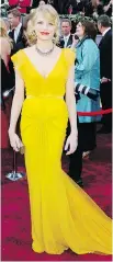  ?? CHRIS PIZZELLO/ THE ASSOCIATED PRESS ?? Michelle Williams wore this dazzling yellow number by Vera Wang in 2006. Some describe it as the greatest Oscar look in history.