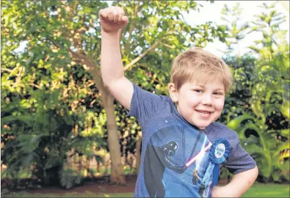  ?? LUCKY BUDD VIA CP ?? Six-year-old Levi Budd of Victoria has become a bit of a sensation for coining the word levidrome to define a word that creates another word when written backwards.