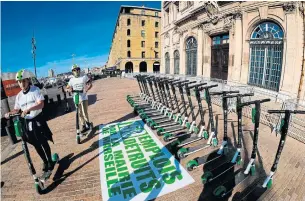  ?? BORIS HORVAT AFP VIA GETTY IMAGES FILE PHOTO ?? Scooter-renting company Lime has rejigged its operations to prove to investors it can turn a profit.