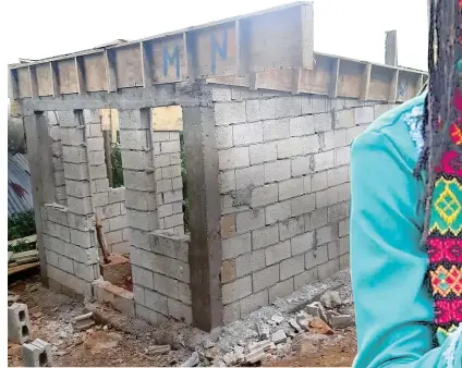  ?? ?? A house that was constructe­d for Uncle C, an elderly man who was living under a tree in Old Harbour, St Catherine.