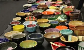  ?? Greater Pittsburgh Community Food Bank ?? Those who attend the Empty Bowls fundraisin­g event April 7 get to choose a handmade bowl for their soup and take it home.