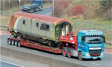  ?? COLIN VALENTINE ?? Advertised for sale by DRS, one-time Virgin Trains ‘Pretendoli­no’ DVT No. 82126 heads southbound on the M6 motorway on March 17 to C F Booth, Rotherham, for scrap.