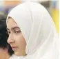  ?? STAN BEHAL / POSTMEDIA NEWS ?? Khawlah Noman, 11, says she is now afraid to walk to school after a man cut her hijab with scissors on Friday.