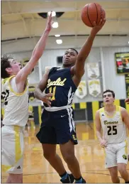  ?? PAUL DICICCO — FOR THE NEWS-HERALD ?? Euclid’s Clayton Cunningham drives to the basket against Riverside on Feb. 24.