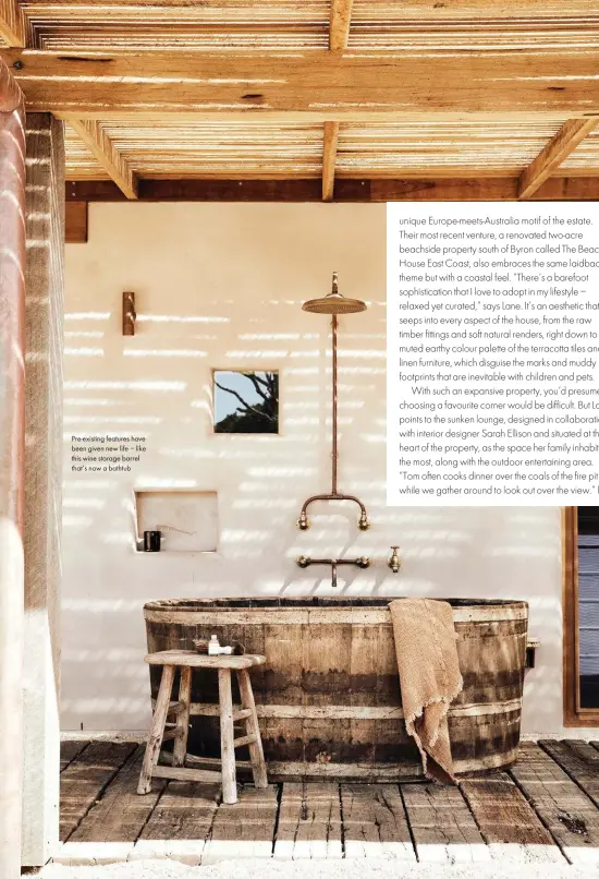  ??  ?? Pre-existing features have been given new life – like this wine storage barrel that’s now a bathtub