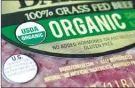  ?? The Associated Press ?? This pound of ground beef, in Walpole, Mass., says it’s organic, but disputes over the rules and reports of fraud may have some questionin­g whether the label means anything.