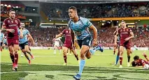  ?? GETTY IMAGES ?? Jarryd Hayne scores a try during game one of the State Of Origin series at Suncorp Stadium.