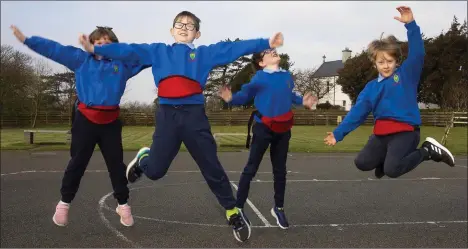  ??  ?? Happy pupils back in school in Ramsgrange, Annabelle O’Leary, Aaron Burke, Aidan Rhodes and Noah Flood.