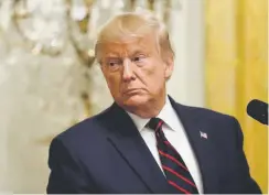  ?? Evan Vucci, The Associated Press ?? President Donald Trump pauses during a news conference in the East Room of the White House on Wednesday.