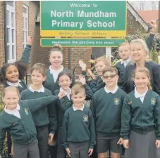  ??  ?? Headteache­r Julia Carey and the school council at North Mundham Primary School