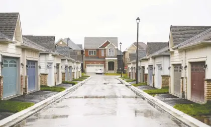  ?? Cole Burston/bloomberg files ?? Canada's housing market is forecasted to remain supercharg­ed, even potentiall­y hitting new highs this year. Factors driving the surge include historical­ly low interest rates, a dearth of housing supply and a Covid-19-driven desire for more space among homeowners.