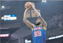  ?? THEARON W. HENDERSON — GETTY IMAGES ?? The Warriors’ Andrew Wiggins shoots a three-point shot against the LA Clippers in October.