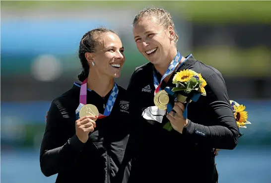  ?? GETTY IMAGES ?? K2 gold medallists Lisa Carrington and Caitlin Regal have another Olympic medal shot with two team-mates in the K4 today.