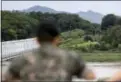  ?? LEE JIN-MAN / THE ASSOCIATED PRESS FILE ?? A South Korean soldier watches the north side at the Imjingak Pavilion in Paju, South Korea.