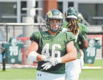  ?? Mike Brohard, Loveland Reporter-Herald ?? Colorado State’s Adam Prentice is taking full advantage of his college experience. As a fullback, Prentice doesn’t expect the limelight for himself, but rather works for his teammates.