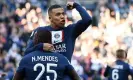  ?? Photograph: Franck Fife/ AFP/Getty Images ?? Kylian Mbappé celebrates with Nuno Mendes after scoring PSG’s first goal against Auxerre.