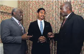  ?? LIONEL ROOKWOOD/PHOTOGRAPH­ER ?? From left: Wayne West, chairman of the Jamaica Coalition for a Healthy Society, speaks with Daniel Thomas of the Love March Movement and Alvin Bailey, bishop and chairman of Jamaica CAUSE, during a press conference to commemorat­e the 70th anniversar­y of the Universal Declaratio­n of Human Rights at Family Life Ministries on Monday.