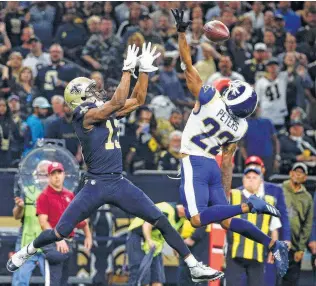  ?? Butch Dill / Associated Press ?? The Rams’ Marcus Peters bats a pass intended for the Saints’ Michael Thomas on Nov. 4. It was one of the few times Peters won that day, as Thomas had 12 catches for 211 yards in the Saints’ win.