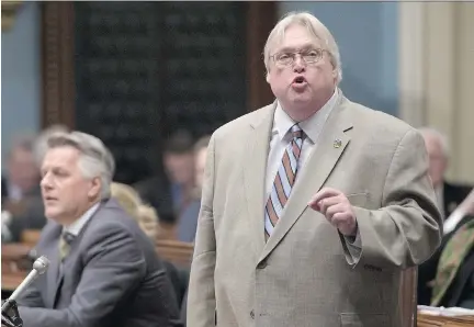  ?? JAC Q U E S B O I S S I NO T/ T HE C A NA D I A N P R E S S ?? Health Minister Gaétan Barrette responds to the Opposition, to deny a rumour on the limitation­s of access to abortions, Wednesday, in the legislatur­e. Barrette said Quebec was planning to double the number of abortions it would recognize to 1,008 per...