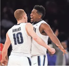  ?? NOAH K. MURRAY, USA TODAY SPORTS ?? With Villanova likely to get a No. 1 NCAA tournament seed, Donte DiVincenzo and Kris Jenkins will have reason to cheer.