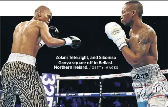  ?? / GETTY IMAGES ?? Zolani Tete,right, and Siboniso Gonya square off in Belfast, Northern Ireland.