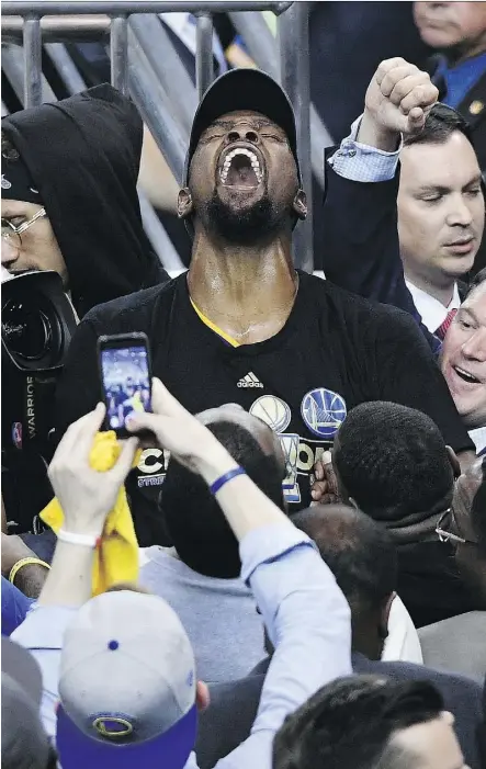  ?? THEARON W. HENDERSON/GETTY IMAGES ?? Golden State Warriors forward Kevin Durant celebrates after his team defeated the Cleveland Cavaliers in Game 5 to win the NBA Finals on Monday in Oakland, Calif.