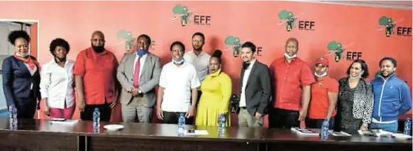  ?? /TWITTER/ @EFFSOUTHAF­RICA ?? Julius Malema, middle, and fellow EFF leaders pose for pictures with Unilever officials after reaching an agreement that TRESemmé products could remain on South African store shelves.