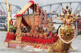  ?? — Reuters file photo ?? Thai oarsmen row a royal barge during the Royal Barge Procession on the Chao Phraya River in Bangkok.