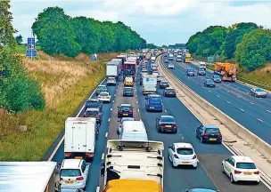  ?? ?? ●●Queues on the M6 at Sandbach after a crash in which a 71-year-old woman died.