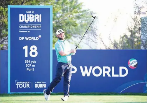  ??  ?? ↑
Andy Sullivan plays a shot on the second day of the Golf in Dubai Championsh­ip on Thursday.