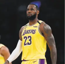  ?? Gary Coronado / Los Angeles Times ?? LeBron James and the Lakers need a combinatio­n of three wins or Clippers losses to clinch the No. 1 spot in the West.