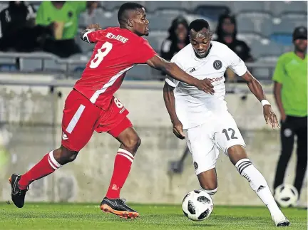  ?? /GALLO IMAGES ?? Justin Shonga of Orlando Pirates in action against Ronald Ketjitjere of African Stars during their CAF Champions League match at Orlando Stadium on Saturday.