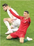  ?? Reuters ?? Portugal’s Cristiano Ronaldo appeals to the referee after a challenge from Iran’s Saeid Ezatolahi in Saransk. —