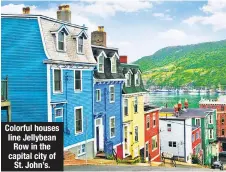  ??  ?? Colorful houses line Jellybean Row in the capital city of St. John’s.