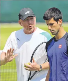  ?? FOTO: DPA ?? Erfolgreic­he Beratung: Mit Boris Becker an der Seite hat Novak Djokovic seine Grand-Slam-Titel Nummer 7 bis 12 gewonnen.