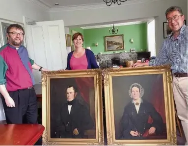  ??  ?? History Pictured with the paintings of Mr and Mrs David Borrie are Rev Nick Baker, Aiofe Sheridan and Jim Duff