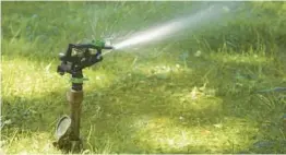  ?? DREAMSTIME ?? Installing an automatic sprinkler system is a great late-summer project.