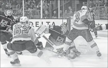  ?? Ringo H.W. Chiu Associated Press ?? KINGS GOALIE Jack Campbell (36) stops a shot by Flyers forward Nicolas Aube-Kubel on Thursday.