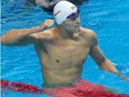  ?? — AFP ?? China’s Sun Yang celebrates after winning gold in the 400m freestyle final in Budapest on Sunday.