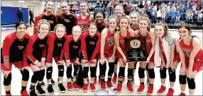  ?? SUBMITTED PHOTO ?? Farmington High School girls varsity basketball team poses with their newly-won District 4A-1 championsh­ip trophy after beating Berryville, 68-58, Saturday at Harrison’s Goblin Arena. The Lady Cardinals defeated Prairie Grove, 60-23; and tourney host Harrison, 57-53, to reach the finals. Farmington takes on Ozark Wednesday at 4 p.m. at the 4A North Regional at Morrilton with a state tournament bid on the line.