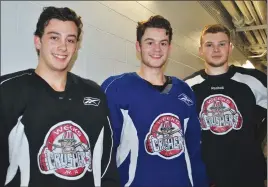  ?? CAROL DUNN/THE NEWS ?? Robert Burrows, left, Jake Martin and Evan MacLennan, all of New Glasgow, are local players on the Weeks Junior A Crushers team.