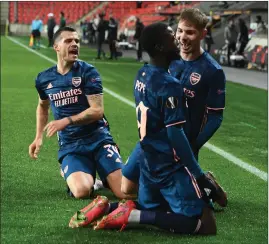  ??  ?? Nicolas Pepe and his Arsenal team-mates after their second goal