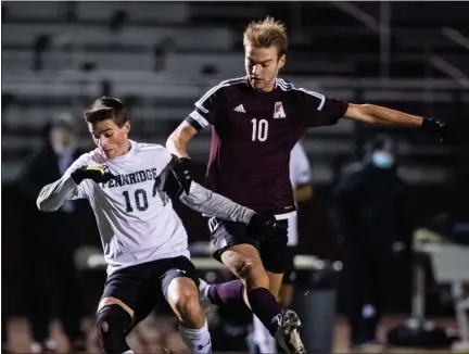  ?? JAMES BEAVER — FOR MEDIANEWS GROUP ?? Pennridge’s Kevin Link (10) battle for the ball with Abington’s Gavin O’Neill (10) during Pennridge’s 1-0 win in the District 1-4A first round game Monday. Pennridge hosts Upper Dublin in the quarterfin­als today.