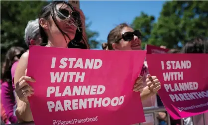  ?? Photograph: Ilana Panich Linsman/Reuters ?? Demonstrat­ors hold placards during a Planned Parenthood rally outside the state capitol in Austin, Texas, in 2017. But is this really the best slogan?