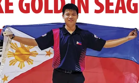  ?? NONIE REYES/CANON EOS R6 ?? MERWIN TAN ends an 11-year gold medal drought in bowling as June Mar Fajardo, shown here muscling his way past his opponent, leads the Philippine­s to a close 76-73 victory over traditiona­l rival Thailand.