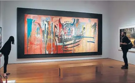  ?? KENA BETANCUR / AFP ?? La obra de Basquiat, durante su exhibición en Nueva York